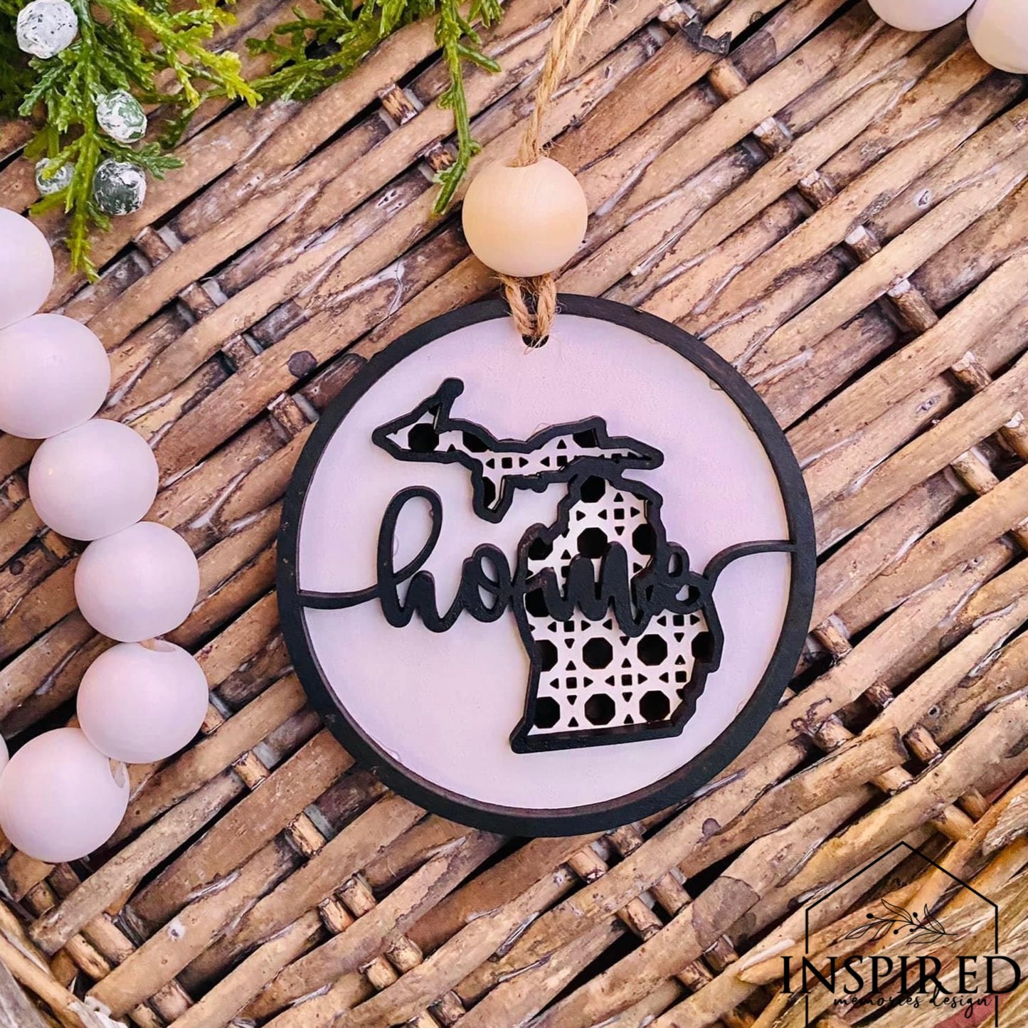 4 inch round ornament made from wood painted white rattan design state of michigan with word home in black