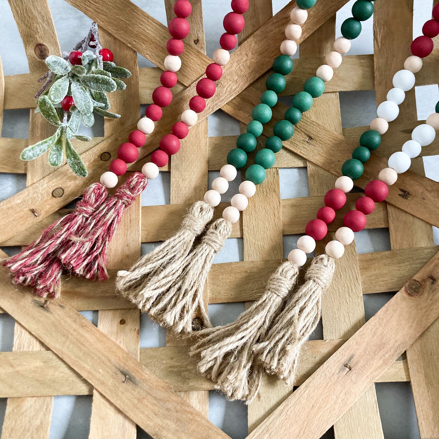 30 inch farmhouse style wood bead garland coming in a variety of colors including red, green, and multicolored